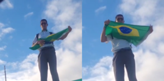 De forma inusitada, rodoviário sobe em teto de ônibus para protestar em Salvador